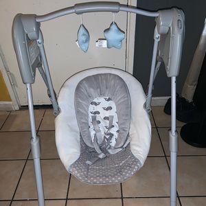 Graco slim baby swing.